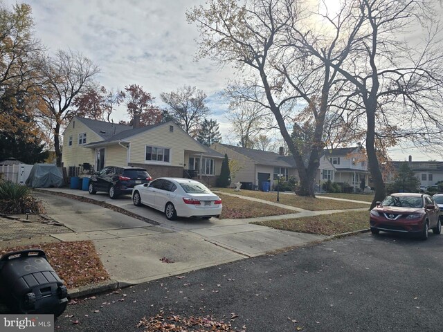 view of front of property with a front lawn