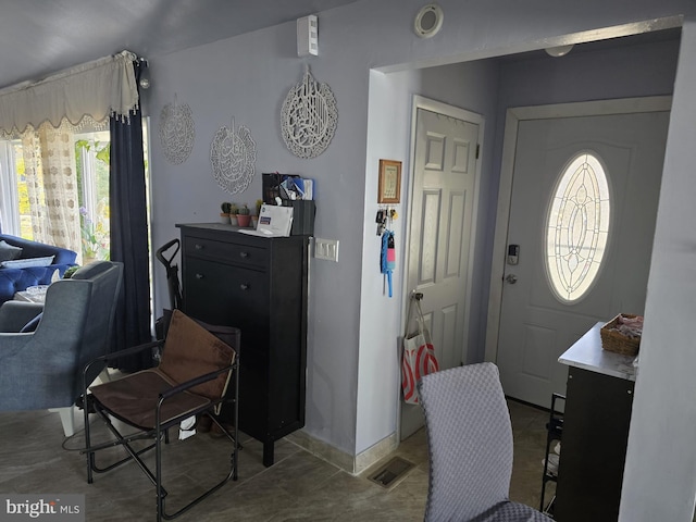 foyer entrance with a healthy amount of sunlight