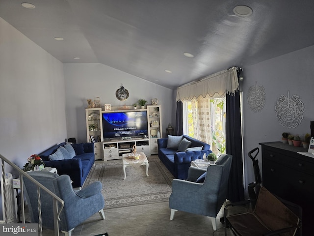 living room with vaulted ceiling