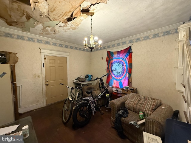 miscellaneous room featuring crown molding, a chandelier, and a textured ceiling