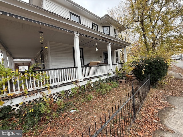 view of property exterior featuring covered porch