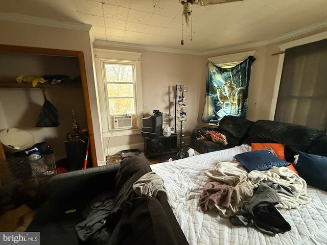 bedroom featuring cooling unit and ornamental molding