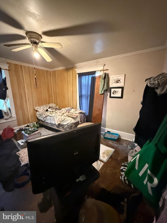 bedroom featuring ceiling fan and crown molding