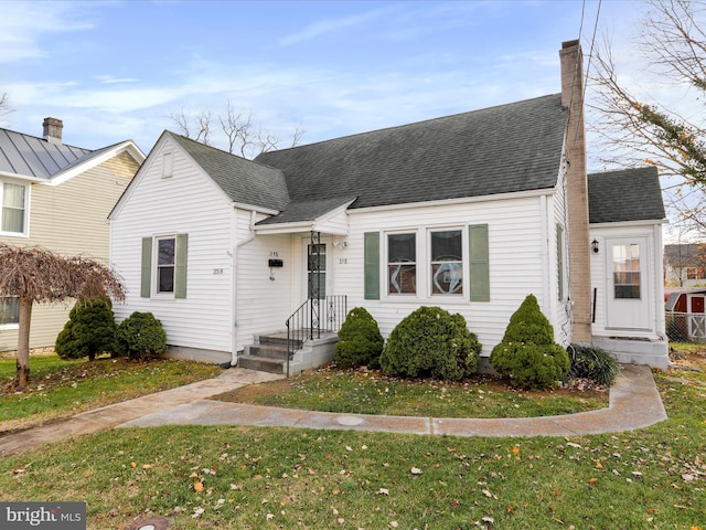 view of front of home with a front yard