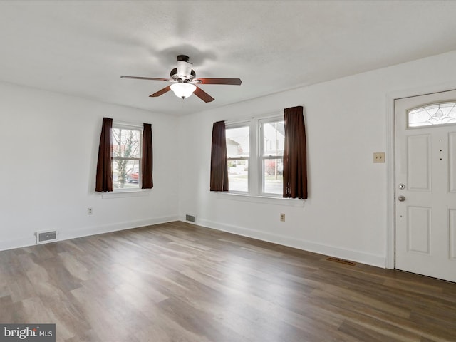 entrance foyer featuring dark hardwood / wood-style floors and ceiling fan