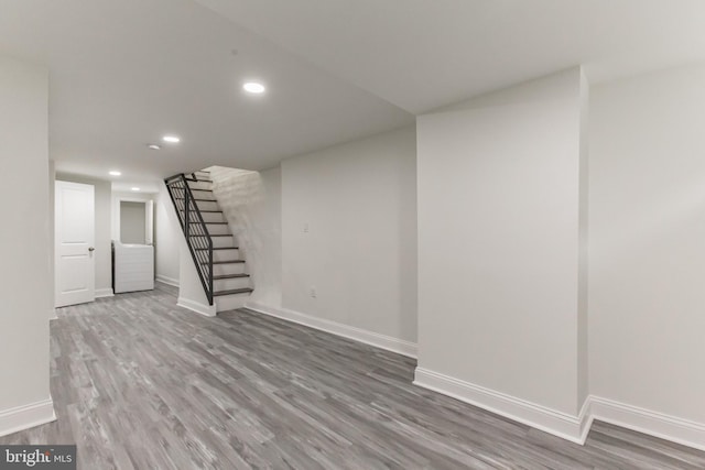 basement featuring hardwood / wood-style flooring