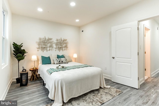 bedroom featuring light hardwood / wood-style floors