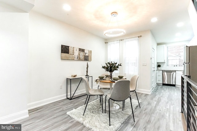 dining room featuring light wood-type flooring