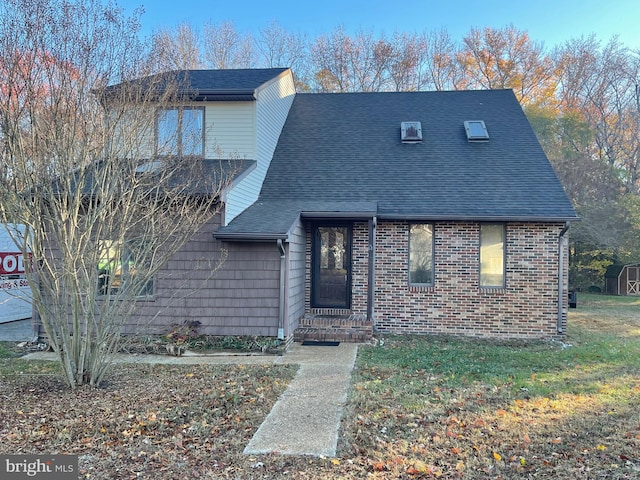 view of front facade with a front yard