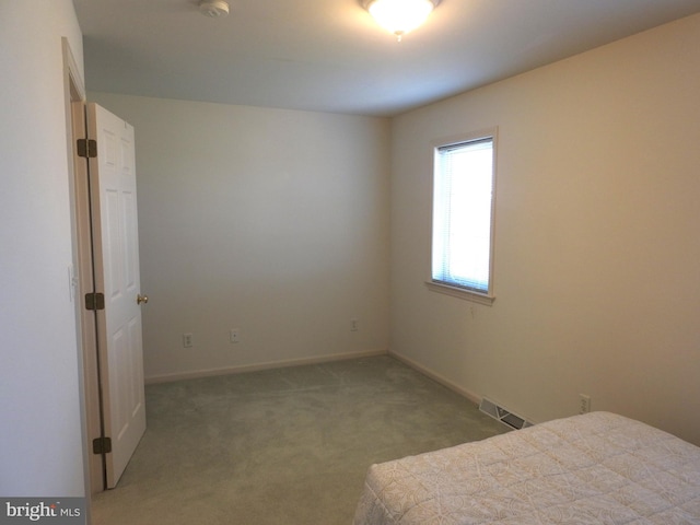 unfurnished bedroom with carpet