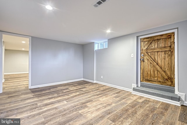 interior space with hardwood / wood-style floors