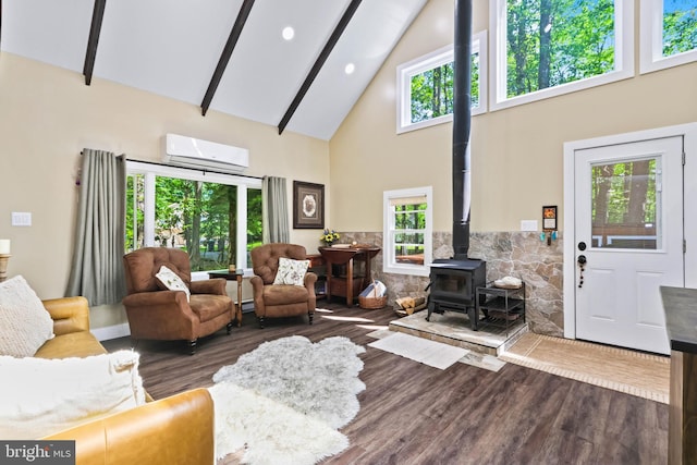 living room with high vaulted ceiling, a wood stove, dark hardwood / wood-style floors, and a wall unit AC