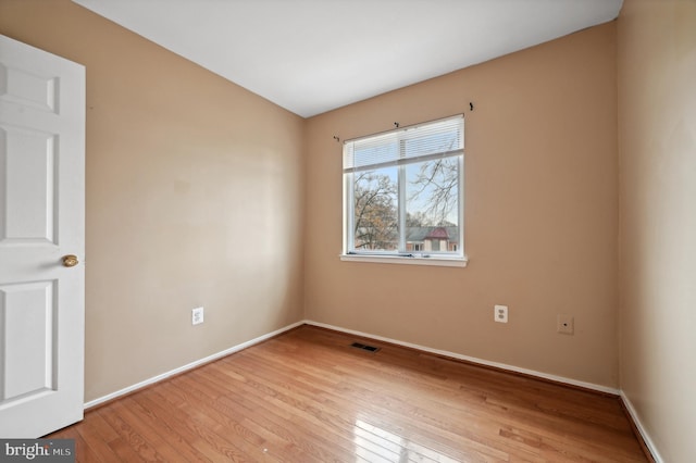 empty room with light wood-type flooring