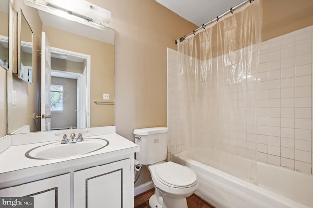 full bathroom with shower / tub combo, vanity, toilet, and hardwood / wood-style floors