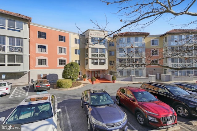 14801 Pennfield Cir Unit 401, Silver Spring, MD 20906 - view of apartment building / complex with uncovered parking