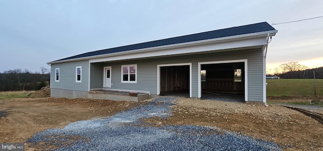 view of front of property featuring a garage