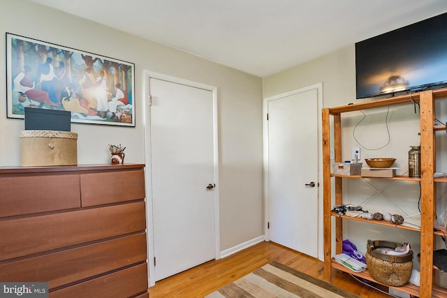 bedroom featuring hardwood / wood-style floors