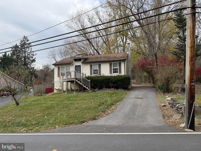 view of front of home with a front yard