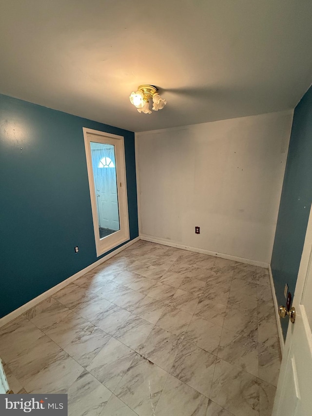 foyer entrance with lofted ceiling