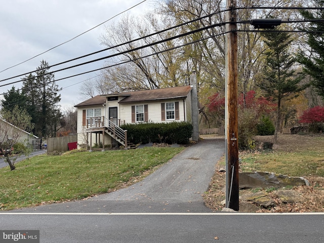 view of front of property with a front lawn