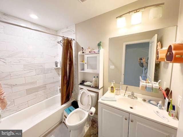 full bathroom with shower / bath combo, vanity, and toilet