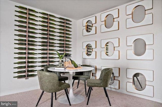 dining area featuring carpet floors