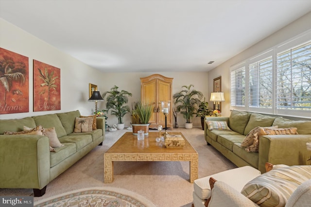 living room with light colored carpet