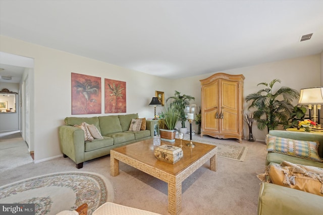 living room featuring light colored carpet