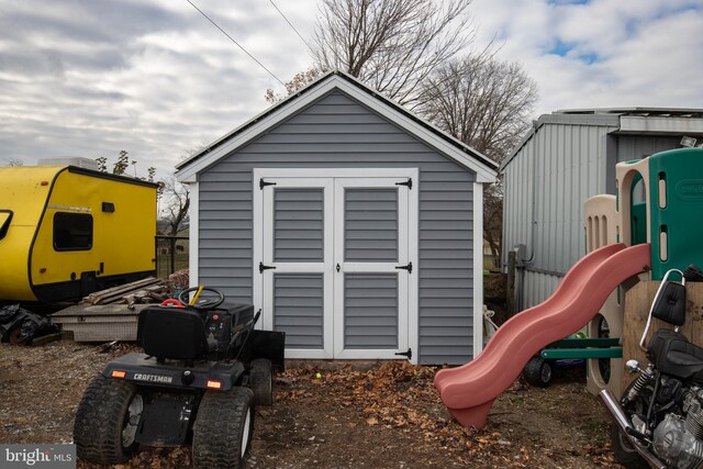 view of outdoor structure featuring a playground