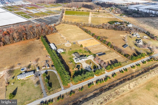 birds eye view of property featuring a rural view