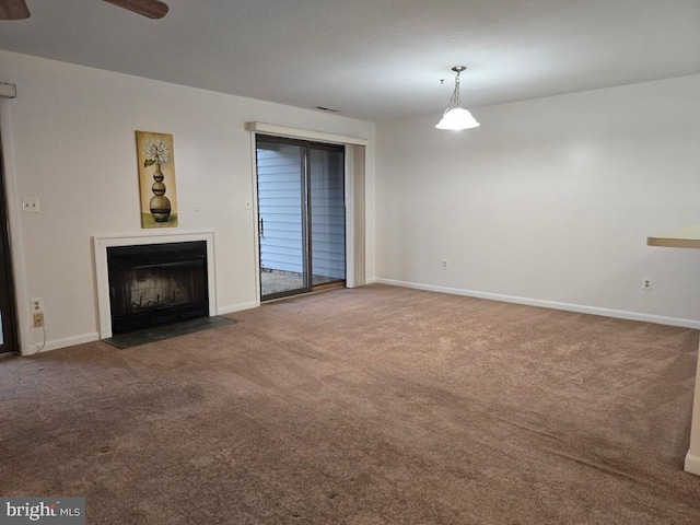 unfurnished living room with carpet