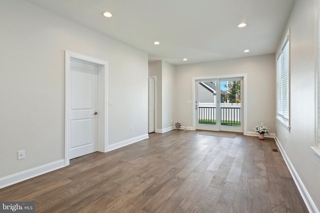 empty room featuring dark hardwood / wood-style floors