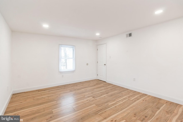 empty room featuring light hardwood / wood-style floors