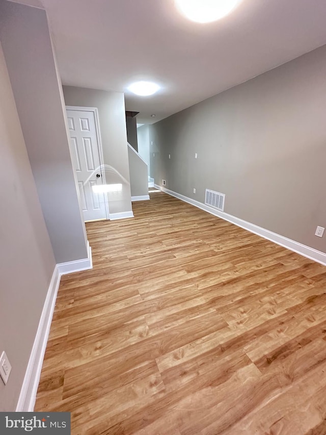 basement with light wood-type flooring