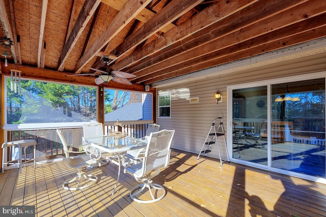 wooden deck featuring ceiling fan