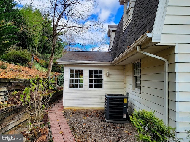 view of home's exterior featuring cooling unit