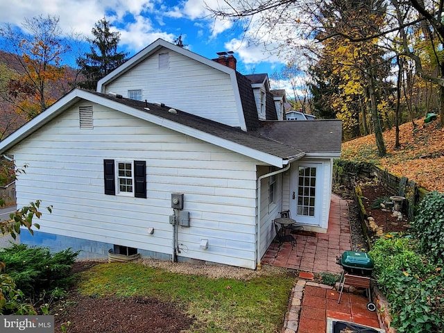 view of home's exterior featuring a patio