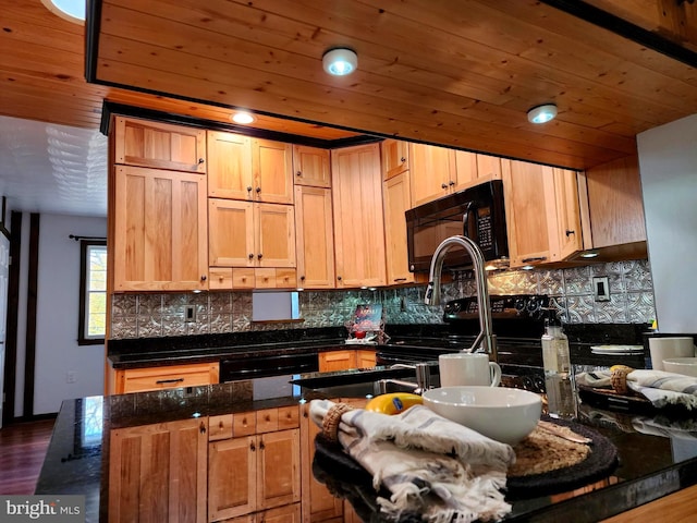 kitchen featuring dark stone countertops, dark hardwood / wood-style floors, wooden ceiling, and black appliances