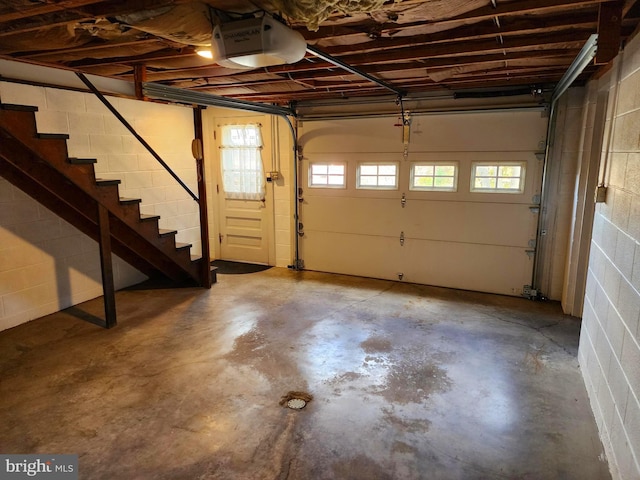 garage featuring a garage door opener