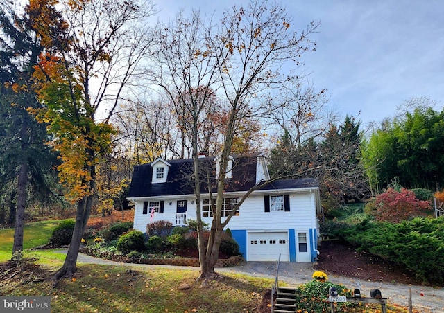 view of front of property featuring a garage