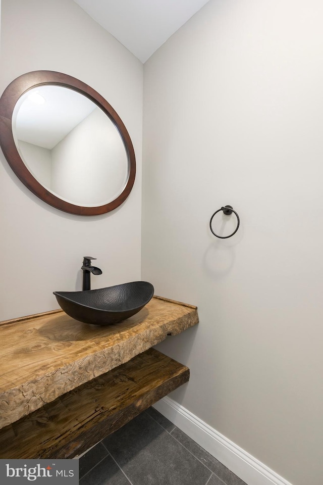 bathroom featuring tile patterned floors and sink