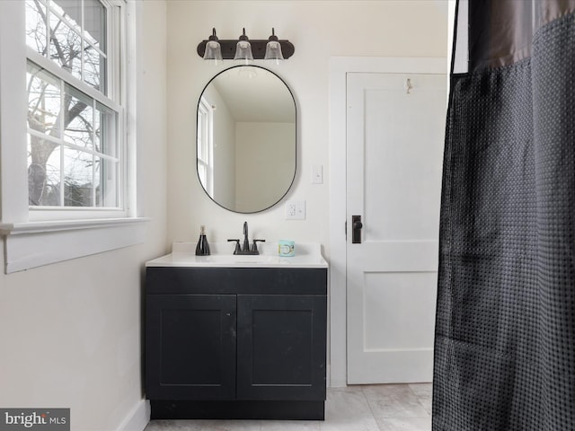 bathroom with vanity and tile patterned floors