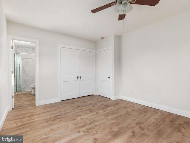 unfurnished bedroom with connected bathroom, ceiling fan, and light hardwood / wood-style flooring