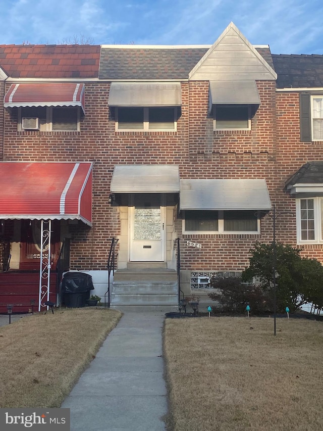 view of property with a front yard