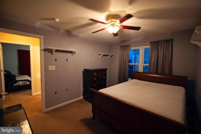 bedroom featuring ceiling fan and light colored carpet