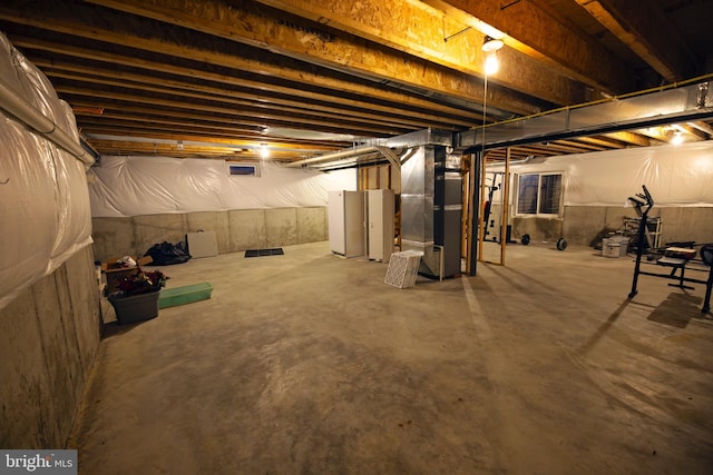 basement featuring heating unit