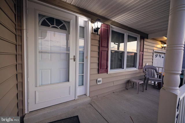 entrance to property with a porch