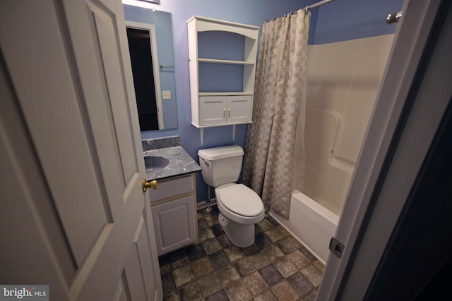 full bathroom featuring vanity, toilet, and shower / bath combo with shower curtain