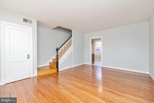 unfurnished room featuring light hardwood / wood-style flooring