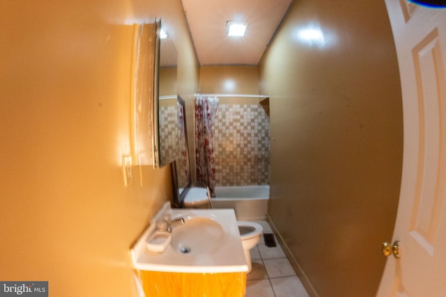 bathroom featuring tile patterned flooring, toilet, vanity, baseboards, and shower / bathtub combination with curtain